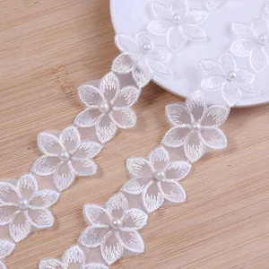 White embroidered six-petal flower lace trim with pearl DIY craft accessory for clothing.