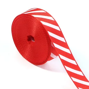 Christmas red white striped grosgrain ribbon detail view for gift wrapping and DIY bows.