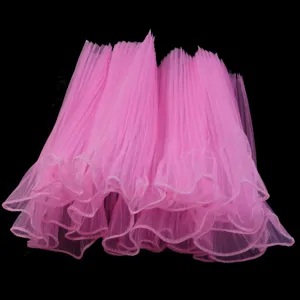 Pink pleated tulle lace trim for bouquet wrapping, garment accessories, and DIY craft projects.