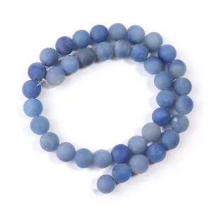 Blue matte gemstone bead detail, smooth round shape, perfect for DIY jewelry crafting.