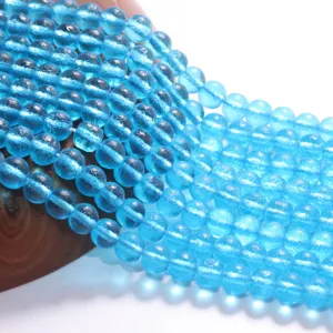 Hellblaue Craquelé Kristall Perlen Stränge für DIY Schmuckherstellung und Zubehör.
