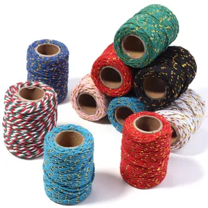 Colorful metallic cotton twine spools for DIY crafts, gift wrapping, and Christmas decor.