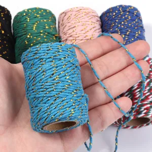 Detailed view of colorful metallic gold cotton cord for DIY crafts and gift wrapping.