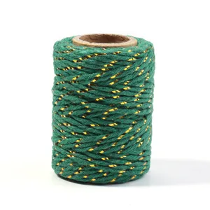 Green and gold metallic twisted twine cord for DIY crafts, gift wrapping, and holiday decor.