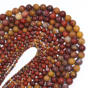 Dettaglio perle sferiche in agata rossa, componenti per gioielli fai da te in pietra