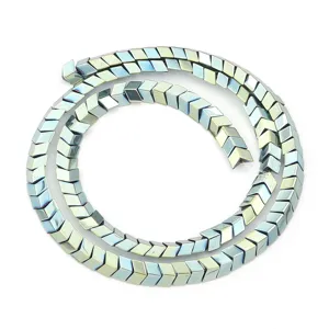 Detailed close-up of V-shaped chevron electroplated hematite loose beads for DIY jewelry making.