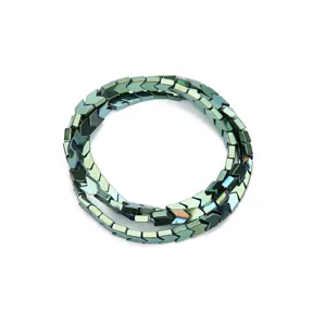 Close-up of chevron hematite beads detail, metallic green vacuum plated spacer accessory.