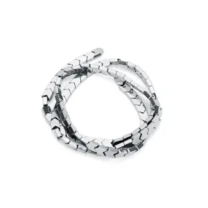 Detailed view of silver V-shaped arrow magnetic hematite beads for DIY bracelet jewelry making.