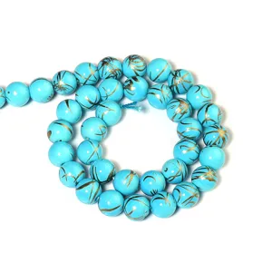 Filo di perle in pietra turchese per creazione gioielli fai da te, blu con venature dorate.