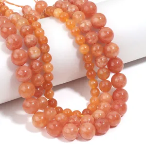 Natural orange gemstone loose beads for DIY jewelry making, bracelets, and necklaces.