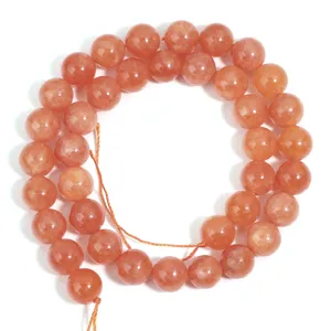 Natural orange sunstone round gemstone beads strand for DIY jewelry making bracelets earrings.