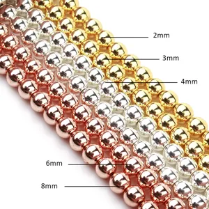 Cuentas redondas de hematites electrochapadas multicolores, perfectas para hacer joyas de bricolaje.