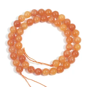 Orange sunstone gemstone beads strand for DIY jewelry making, bracelets and necklaces.