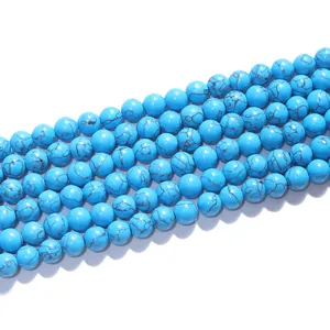 Synthetic blue turquoise gemstone beads detail shot for DIY jewelry making and craft projects.