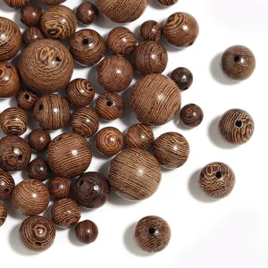 Gedetailleerd overzicht van houten ronde losse kralen met natuurlijke nerf voor sieraden maken.