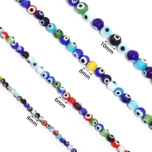 Colorful glass evil eye round beads detail showing different sizes for DIY jewelry making.