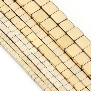 Close-up detail of square gold-plated hematite beads, perfect for DIY jewelry making accessories.