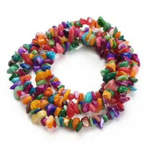 Detailed view of colorful irregular crushed stone chip beads, perfect for DIY jewelry making.