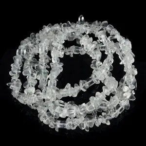 Detail shot of natural white crystal irregular chip beads, perfect for DIY jewelry making.