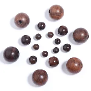 Detailopname van houten kralen, natuurlijke houtnerf ronde tussenkralen voor sieraden maken.