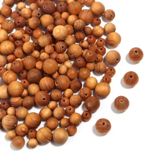 Natuurlijke houten losse kraaltjes met geboorde gaten, perfect voor DIY sieraden maken en armbanden.