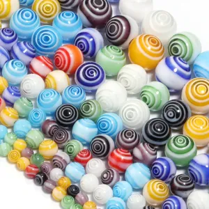Colorful swirl glass round loose beads close-up detail for DIY jewelry making.