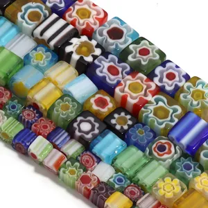 Close up detail of colorful millefiori glass square beads for DIY handmade jewelry accessories.