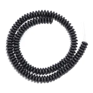Close up of electroplated black hematite faceted abacus beads for DIY jewelry making.