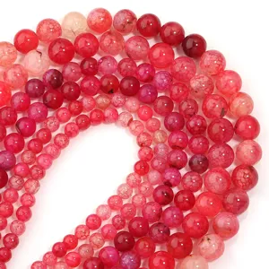 Dettaglio perline in agata rossa crepata, perfetto per creare gioielli e bracciali.