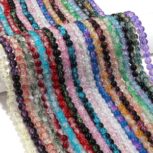 Close-up details of colorful crackle glass round beads, perfect for DIY jewelry making accessories.