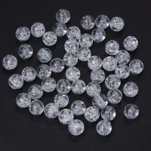 Detailed close-up of clear crackle glass beads for DIY jewelry making, showing crystal texture.