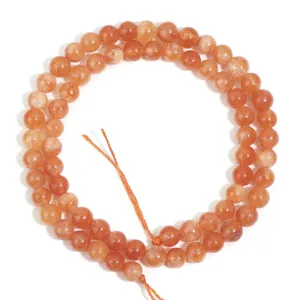 Natural orange sunstone loose beads detail, perfect for DIY jewelry making, bracelets and necklaces.