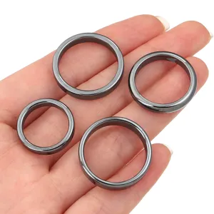 Close-up detail of smooth black hematite ring bands, perfect for DIY jewelry crafting accessories.