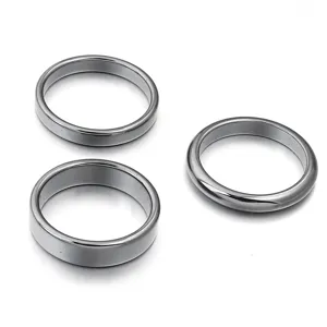 Close-up detail of smooth arc-shaped black hematite ring jewelry accessories, ideal for DIY.