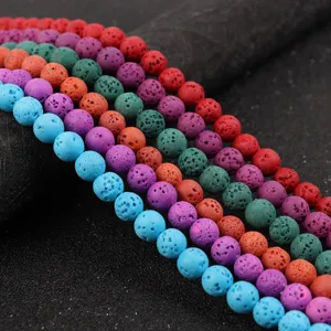 Close-up detail of colorful porous lava stone beads, perfect for DIY jewelry and bracelets.
