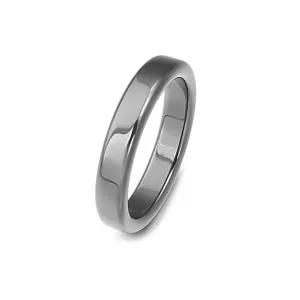 Hematite ring detail, smooth curved black stone band, minimalist DIY jewelry accessory close-up view design.