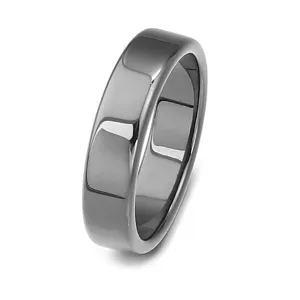 Close-up of smooth arc-shaped black hematite ring band, ideal for DIY jewelry making.