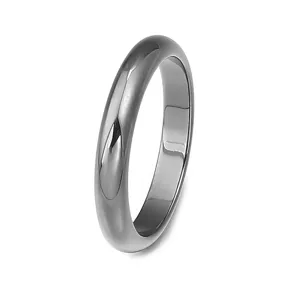 Detail view of a smooth polished black hematite ring, perfect for DIY jewelry making.