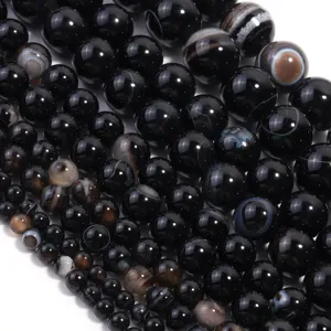 Perle tonde in agata nera striata naturale per la creazione di gioielli fai da te.