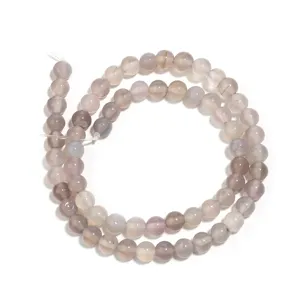Grey natural agate loose beads detail view, smooth round bead strand for DIY handmade jewelry.