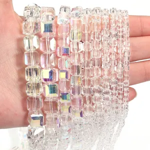 Faceted crystal cube beads detail view, sparkling AB coated transparent jewelry making.