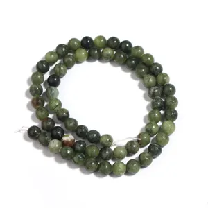 Green natural jade stone beads for DIY bracelet jewelry making, smooth round gemstone detail.