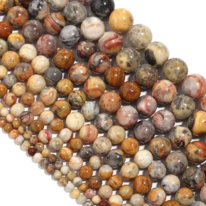 Natural crazy lace agate round loose beads, polished gemstone DIY jewelry making components detail view.