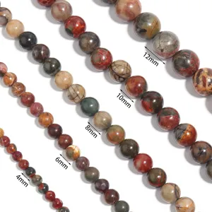 Picasso jasper stone beads detail view, showing various sizes of round loose beads for DIY jewelry.