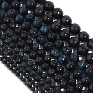 Dark blue tiger eye gemstone round beads detail shot for DIY jewelry making and bracelets.