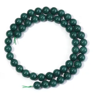 Dark green gemstone loose beads detail view, perfect for DIY jewelry making and bracelets.