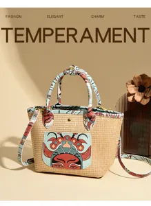 Woven straw shoulder bag with opera mask patch, stylish daily commuter handbag for women.