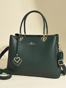 Elegant dark green leather tote bag with gold hardware for women daily fashion style.
