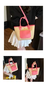 Stylish straw woven handbag with pink PU leather trim, perfect for daily commute and casual use.