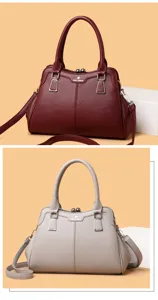 Elegant PU leather shoulder handbag with kiss-lock closure and textured design for women.